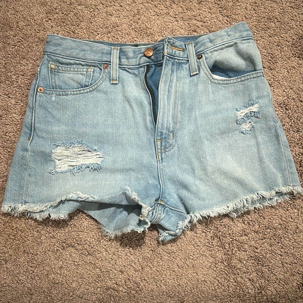 Madewell light denim distressed shorts